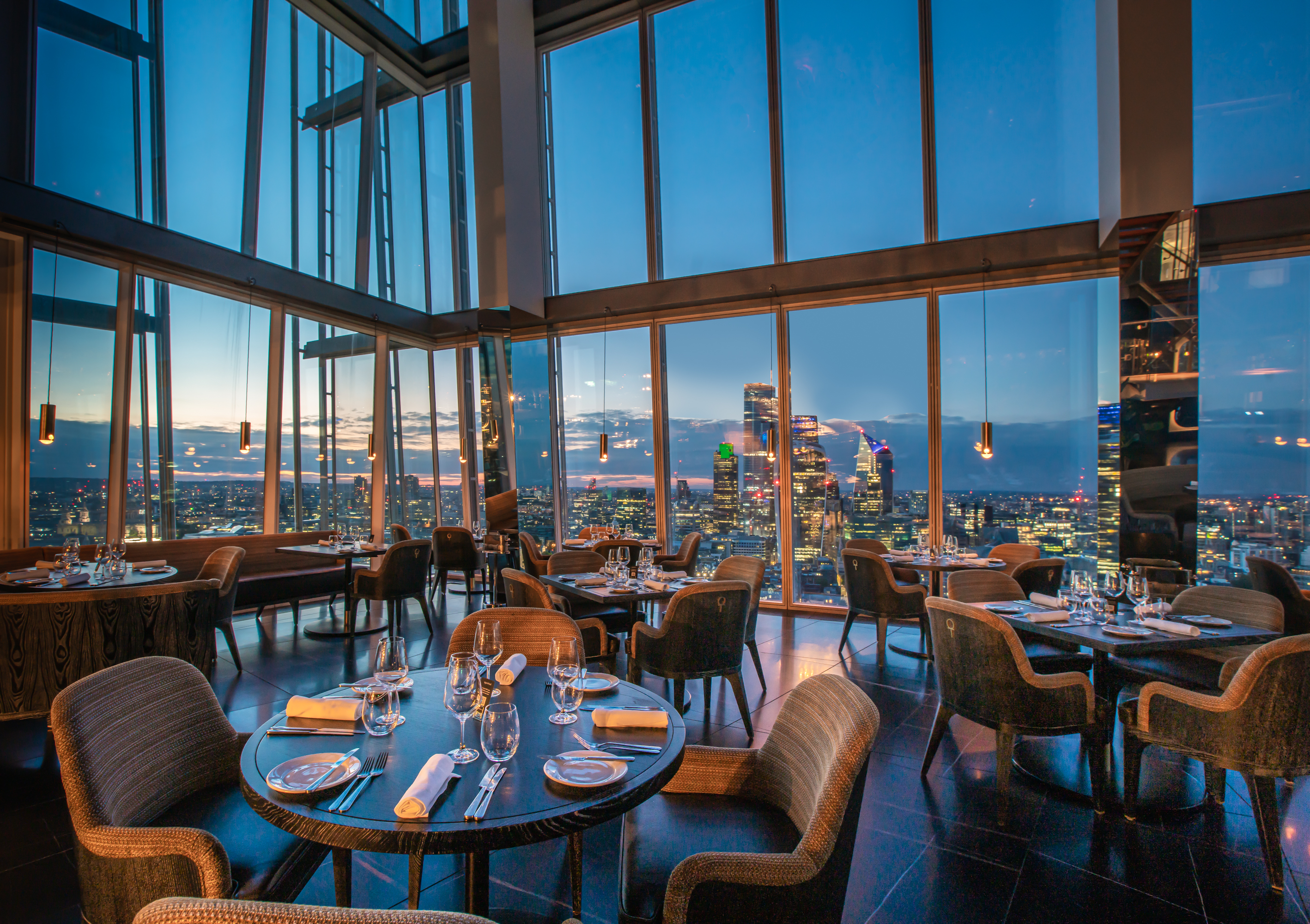 Private dining room at Aqua Shard with panoramic views for corporate events and gatherings.