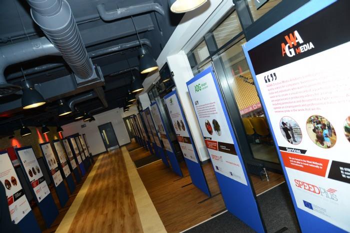 WV1 Whole exhibition space at Molineux Stadium with vibrant displays for networking events.
