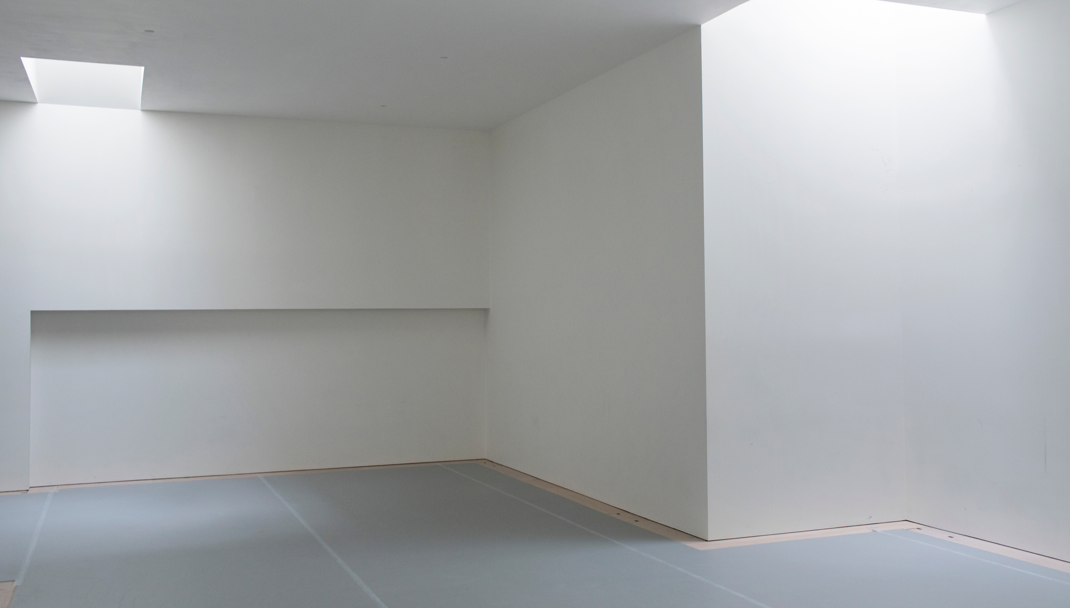 Minimalist event space in Studio Wayne McGregor with natural light for versatile setups.