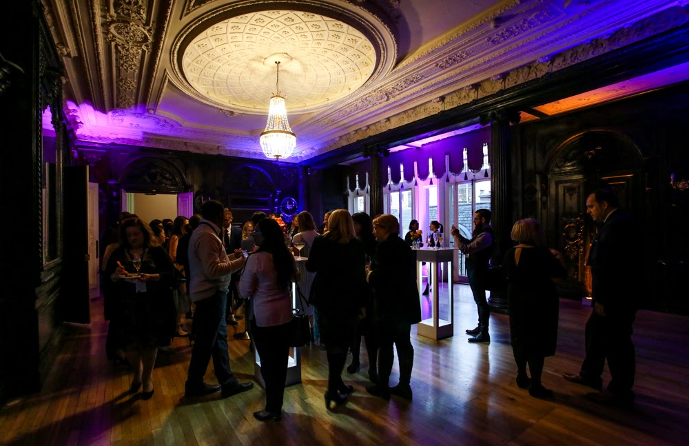 Churchill Room at Dartmouth House, elegant purple lighting for corporate events.