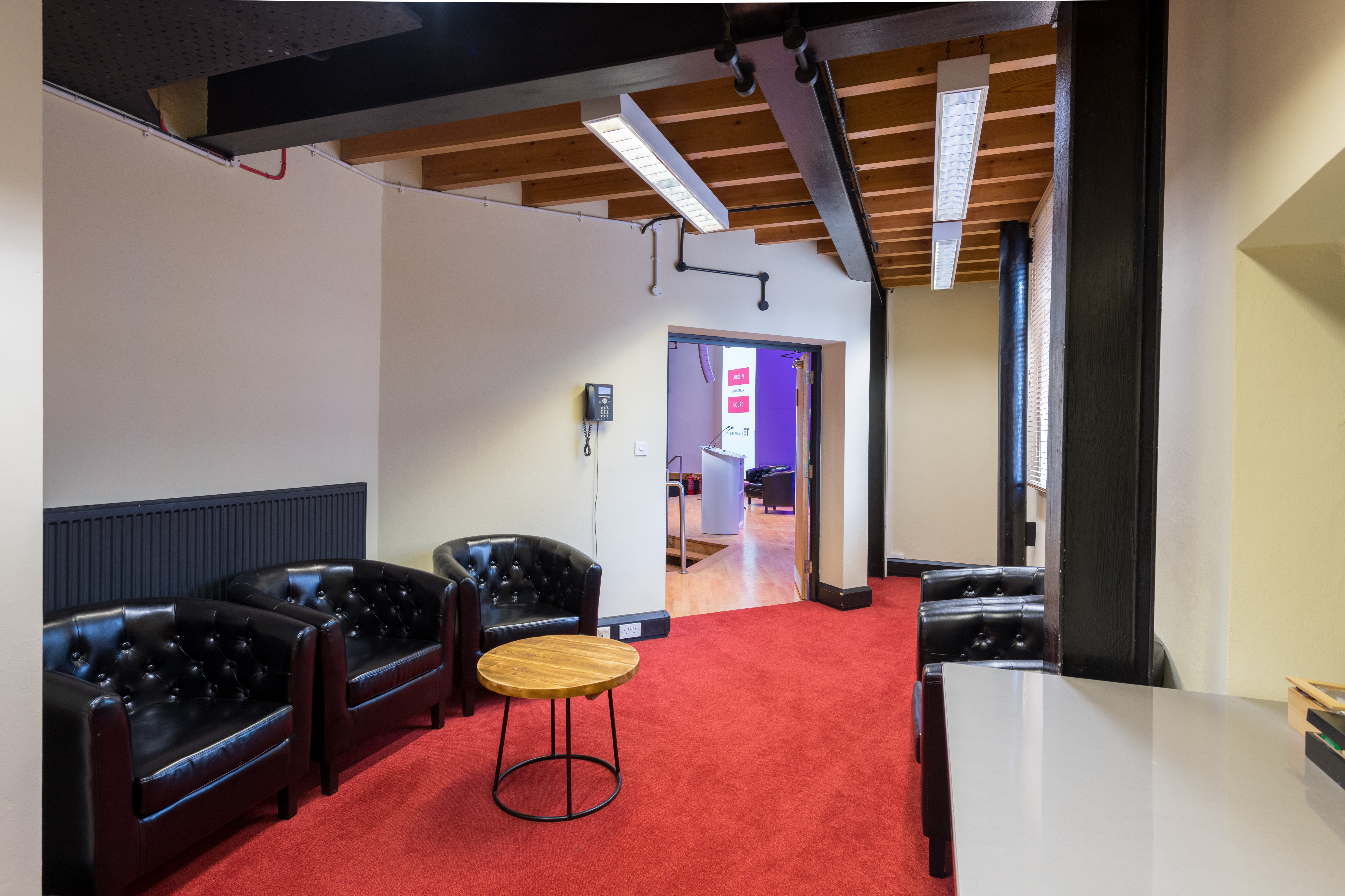 Kingston Theatre at IET Birmingham: stylish meeting space with leather seating for networking events.