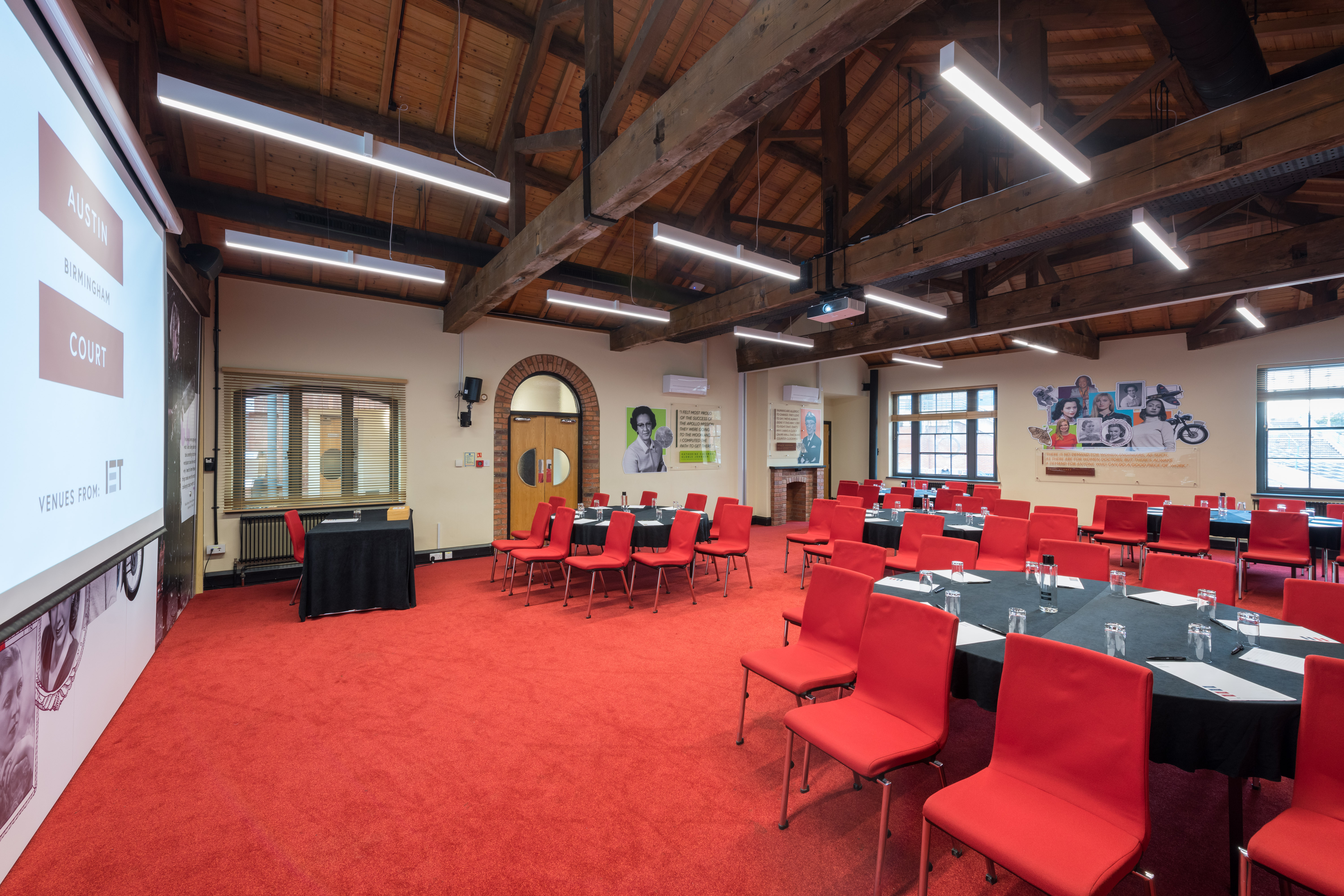 Lodge Room 2 at IET Birmingham: Austin Court, featuring round tables for corporate workshops.