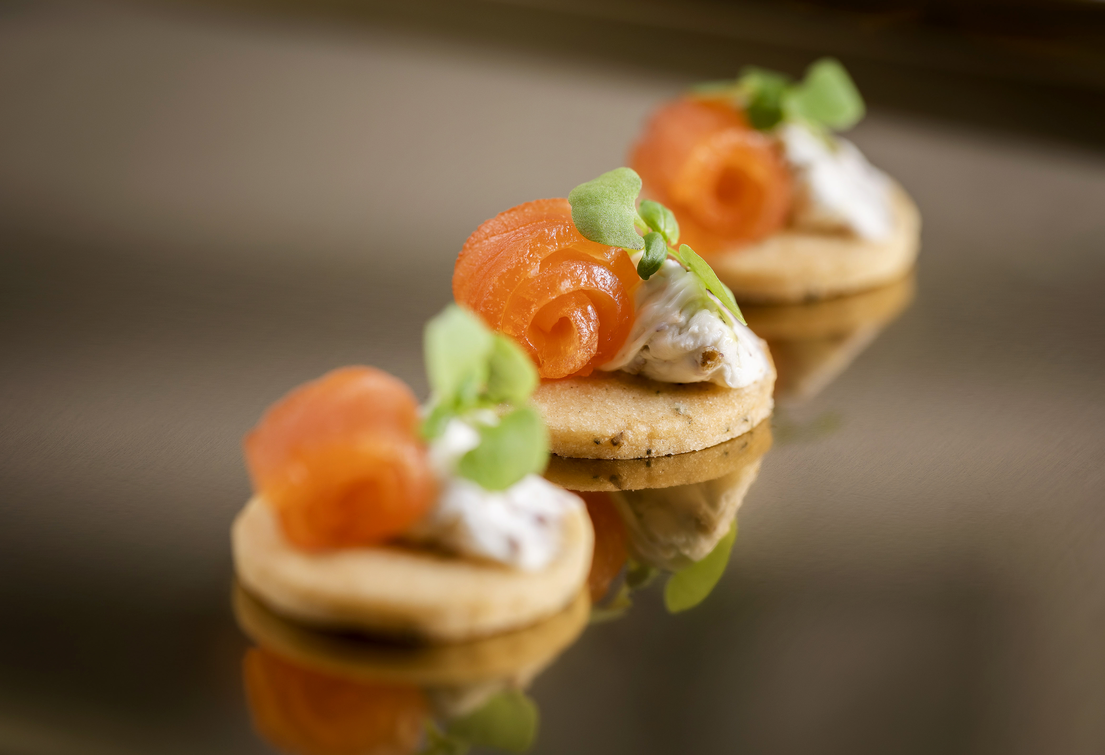 Elegant hors d'oeuvre with smoked salmon at Nash Room, perfect for upscale events.