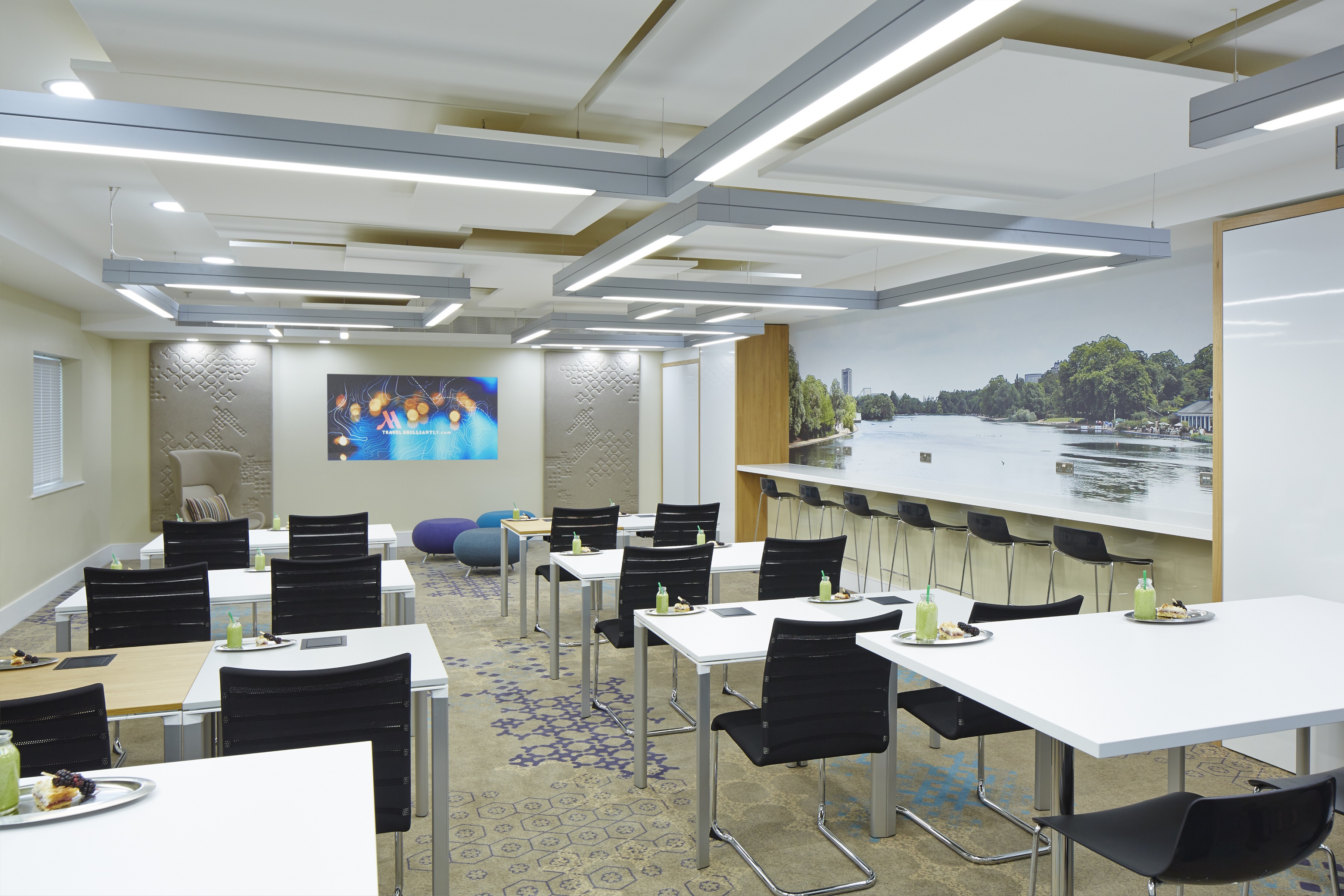 Modern meeting room at London Marriott Kensington, perfect for corporate events and workshops.