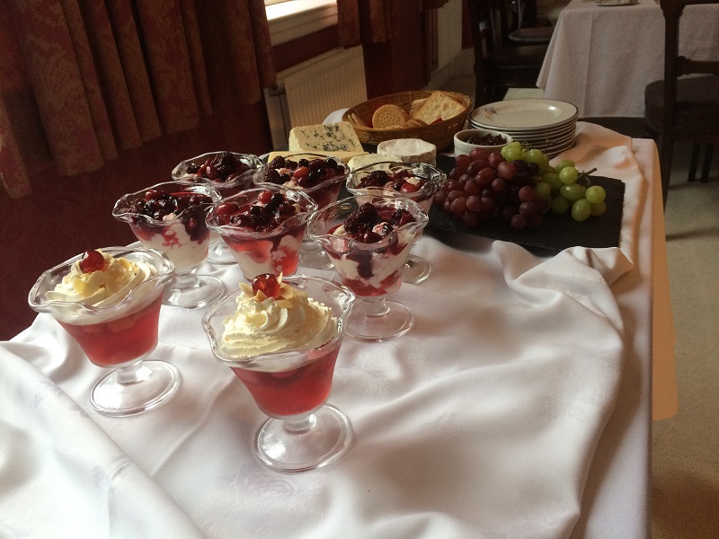 Elegant dessert display with parfaits and cheese at St Pauls Club for events.