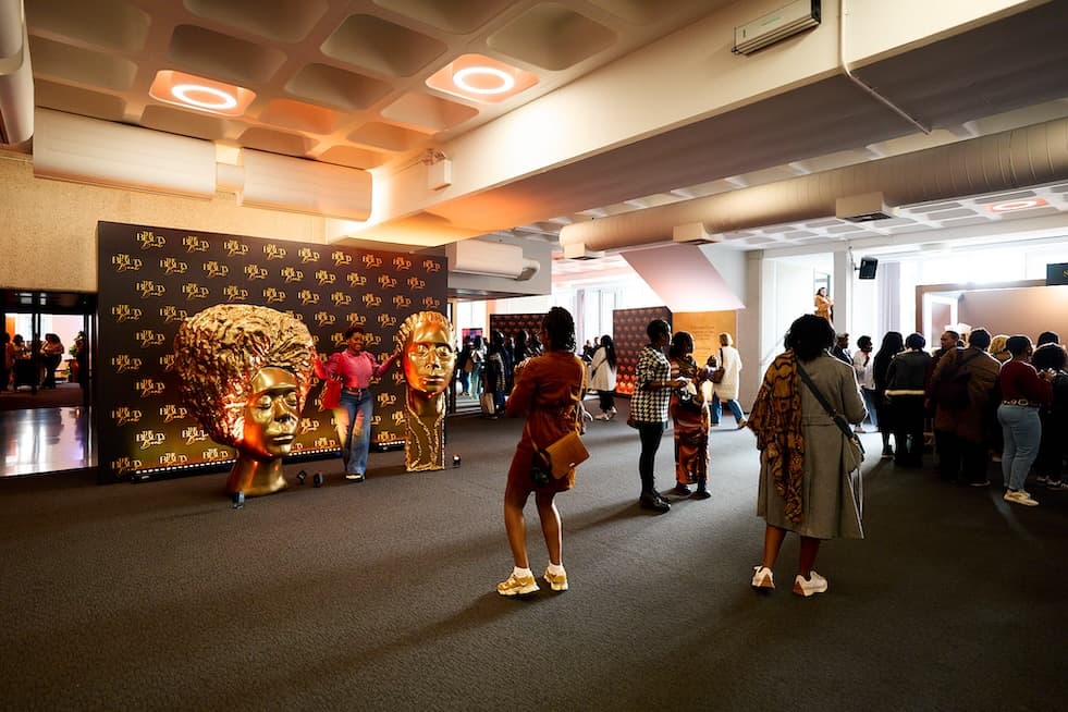 Pickwick event arrival zone with branded backdrop and sculptural installations for social media.