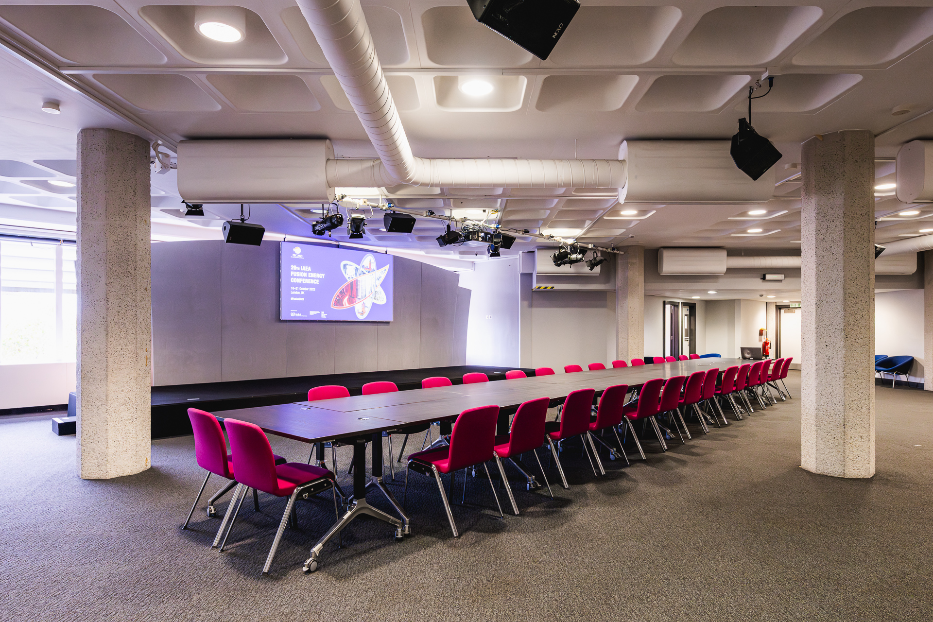 St James meeting room with pink chairs, ideal for corporate workshops and meetings.