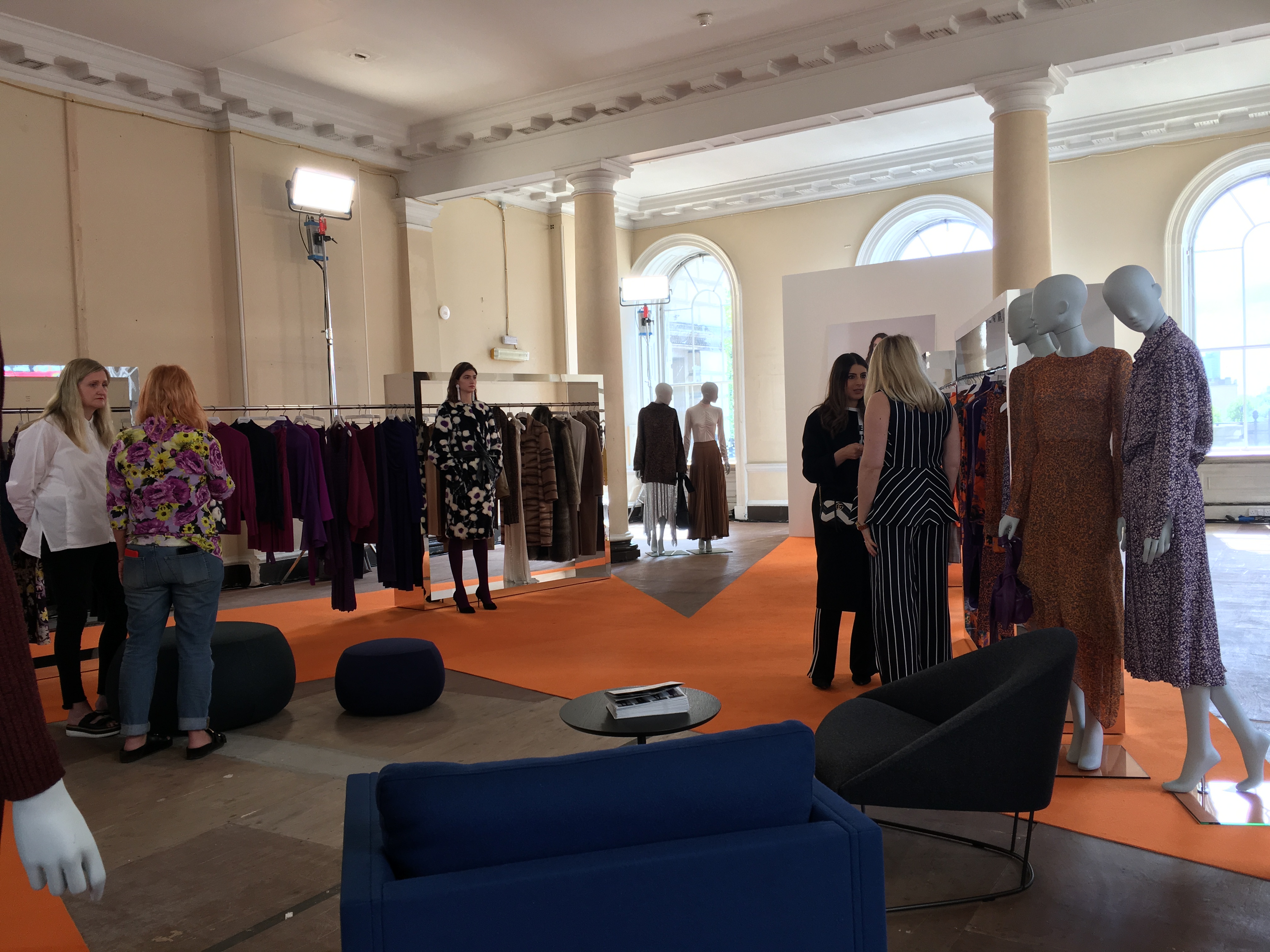 Stylish event space at Somerset House for a fashion showcase with mannequins.