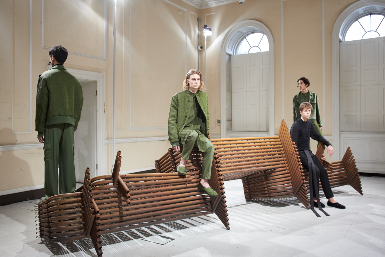 Contemporary fashion presentation at The River Rooms, Somerset House with stylish models.