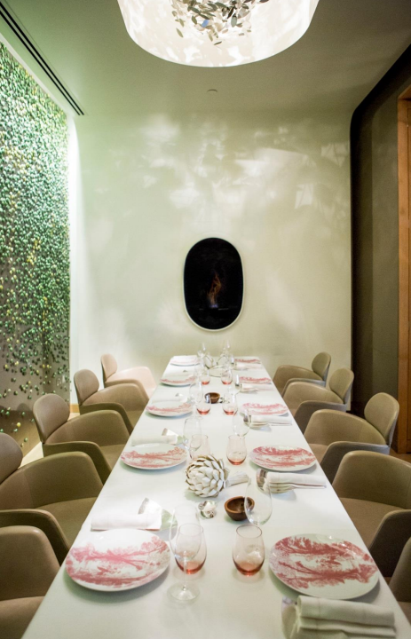 Elegant dining setup at Salon Privé, ideal for exclusive events and intimate meetings.