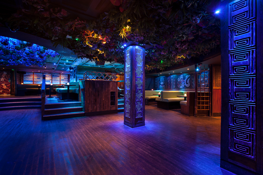Vibrant Mahiki London venue with colorful lighting for events and celebrations.