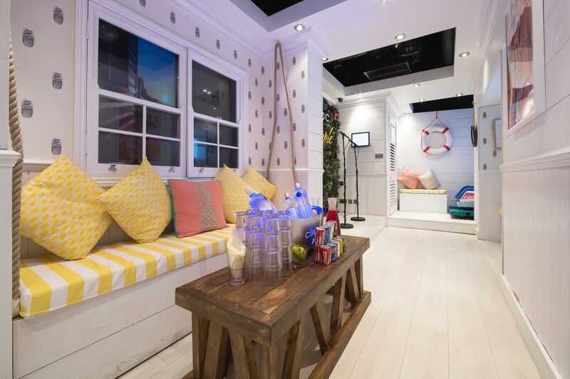 Vibrant beach-themed event space in Mahiki London with casual seating for summer gatherings.