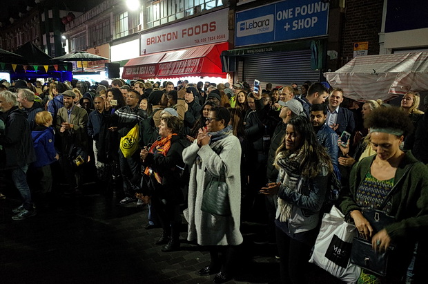 Crowd at vibrant Electric Avenue outdoor market event showcasing engagement and inclusivity.