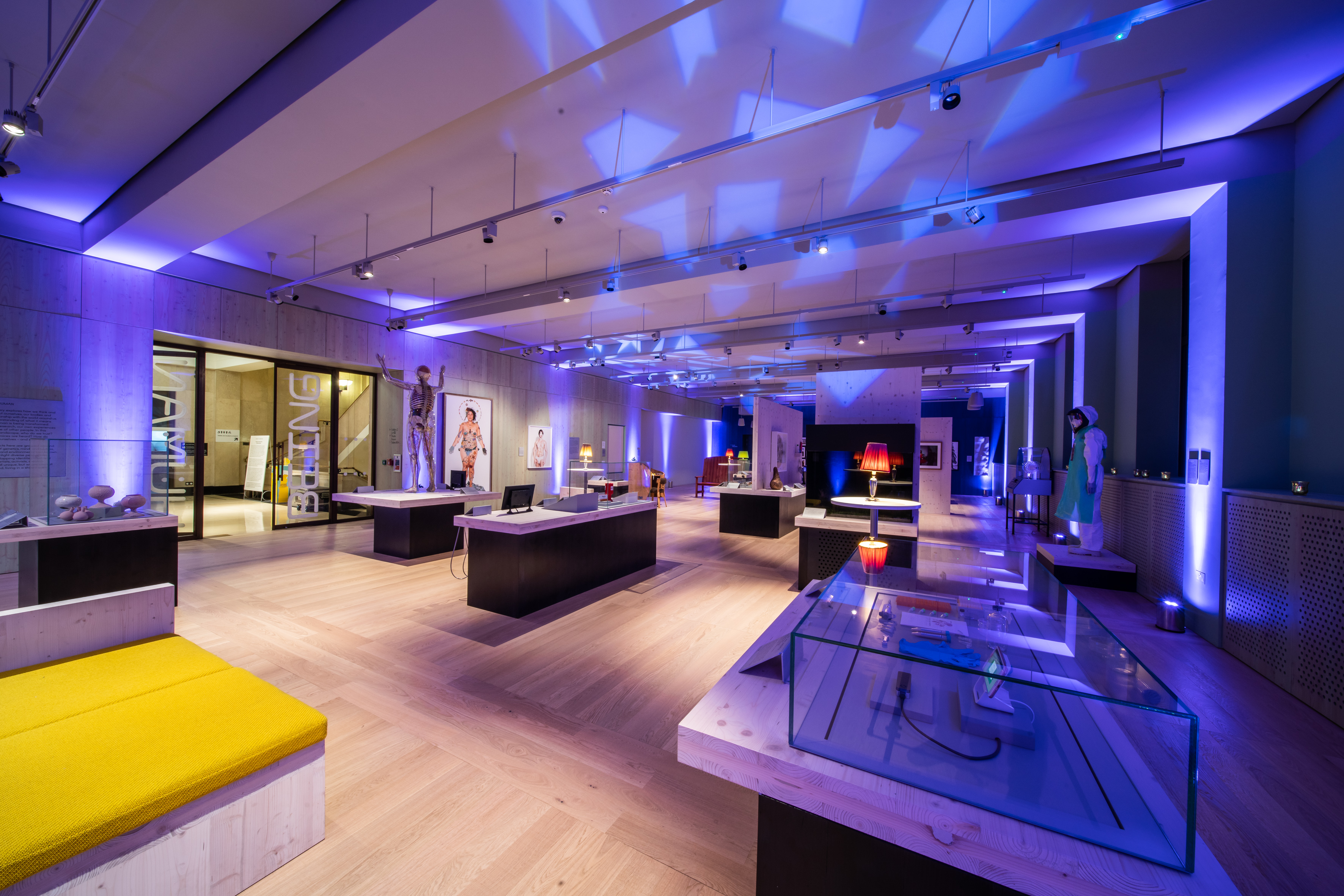 Being Human Exhibition at Wellcome Collection, modern event space with sleek furniture.