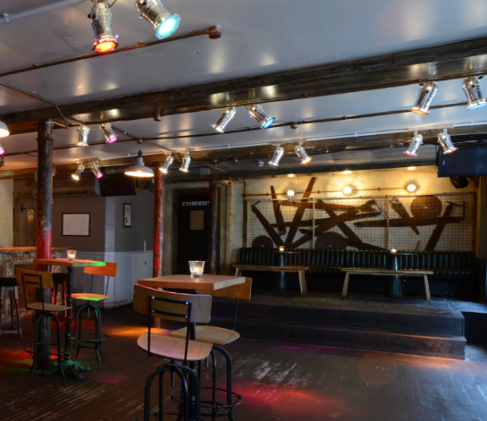 Ground floor main space with lighting and stage