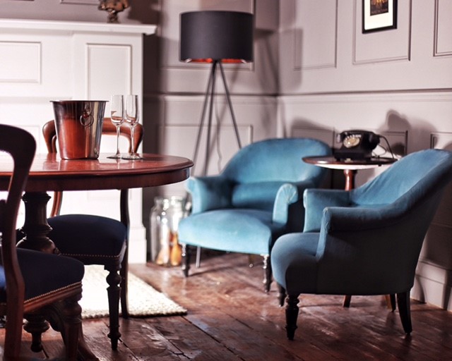 Stylish meeting space with plush chairs for film locations and product launches.