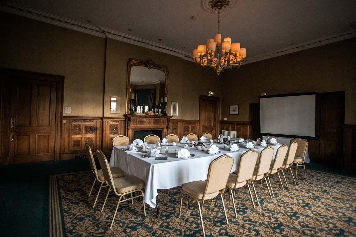 Dickinson Suite at Shendish Manor: elegant meeting room for intimate gatherings and presentations.