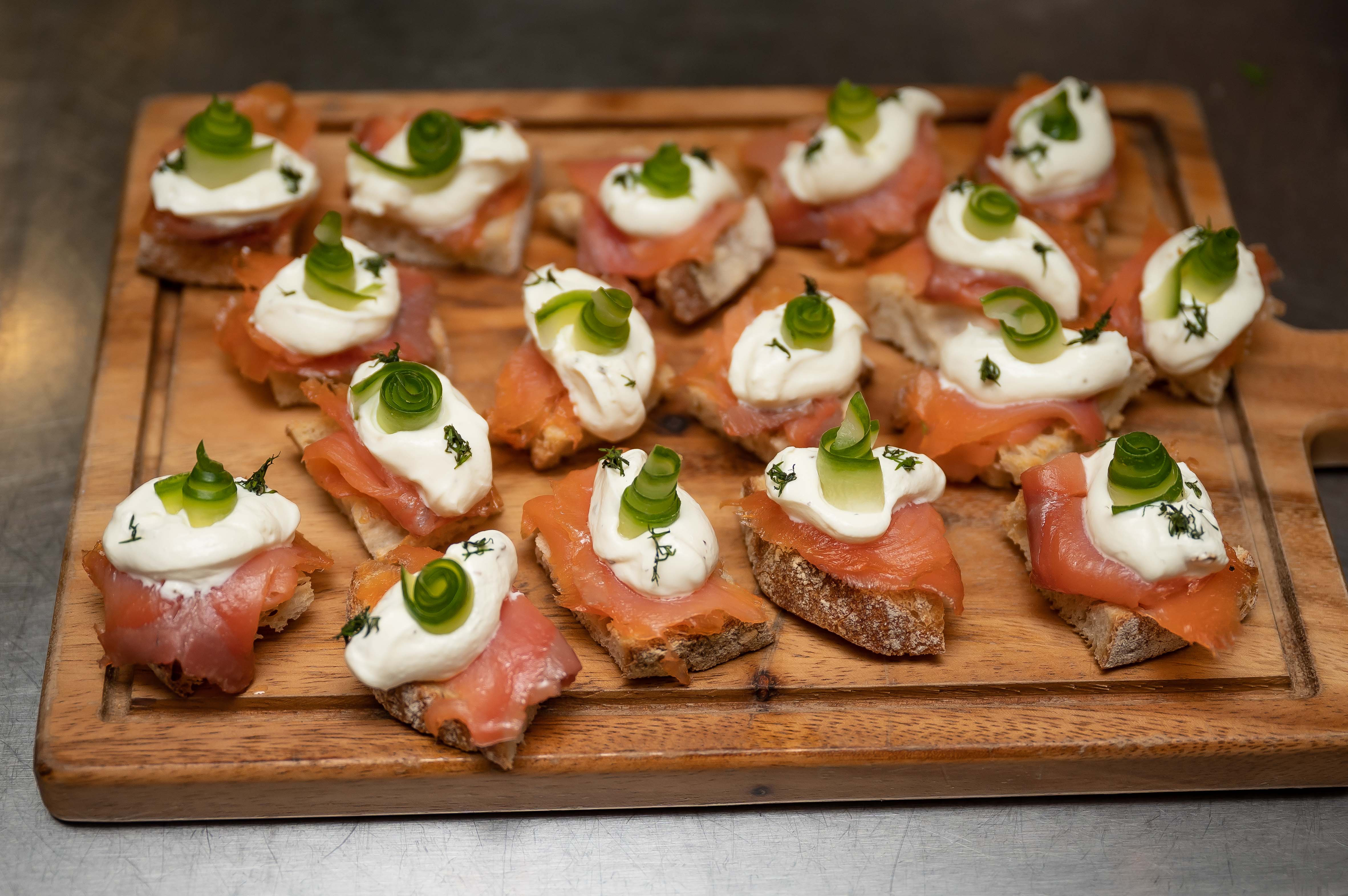 Elegant canapés with smoked salmon at The Vault Bar, ideal for cocktail receptions.