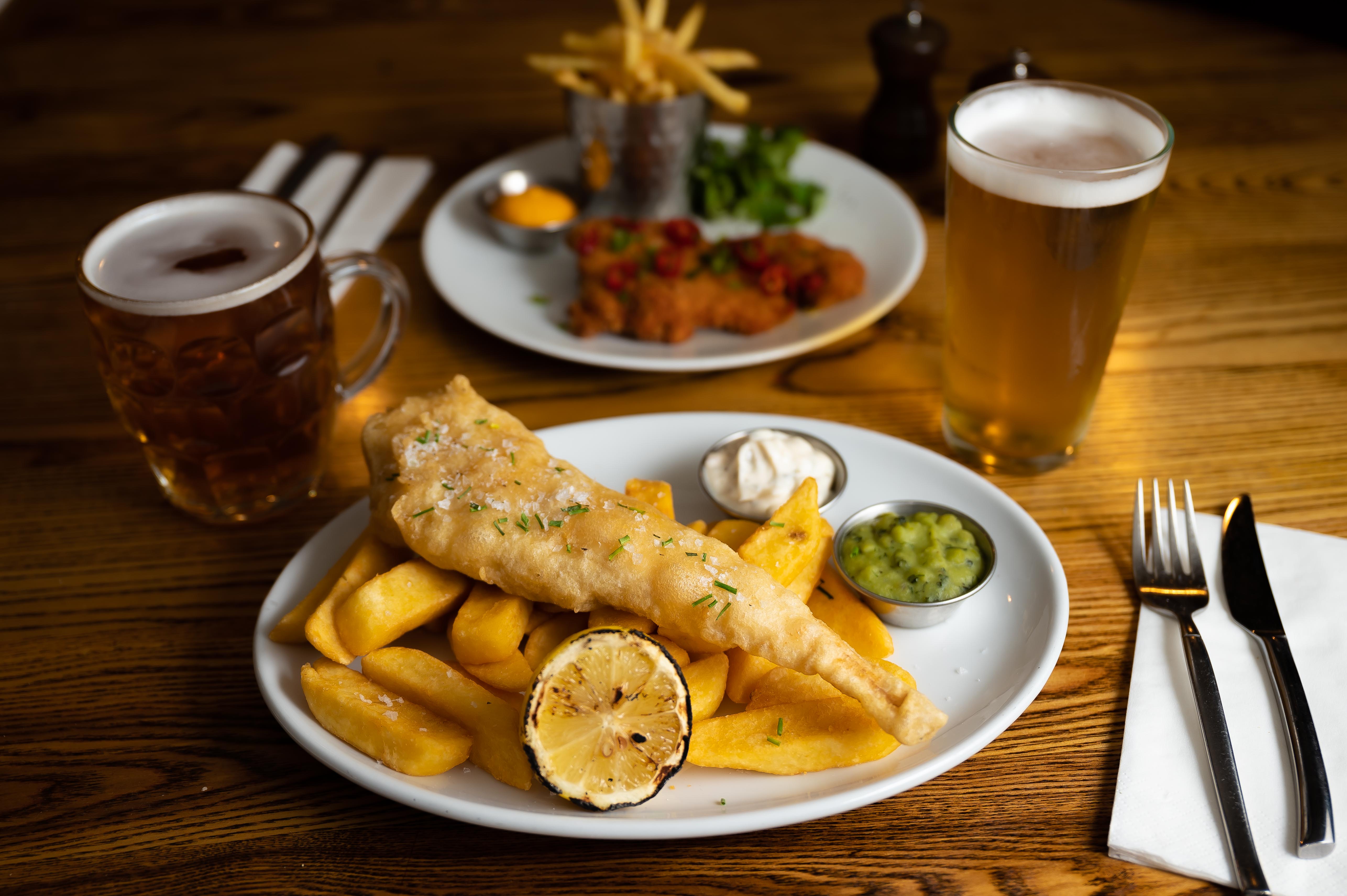 Fish and chips meal at The Vault Bar, ideal for events and catering.