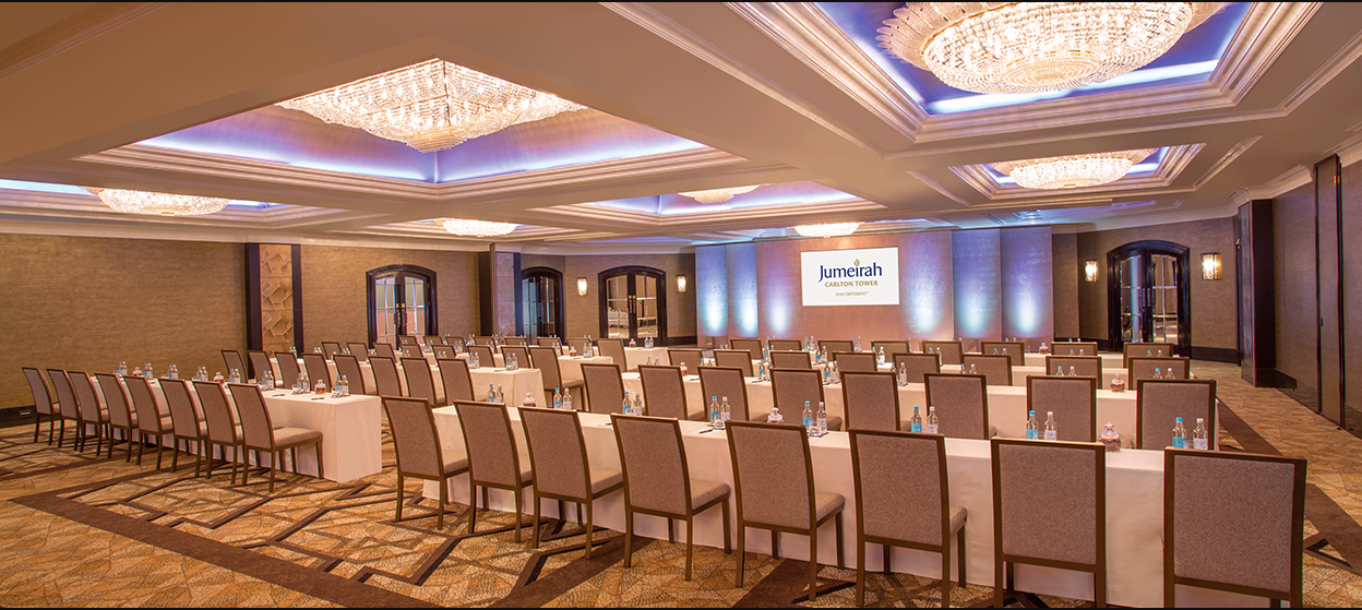 Conference room at Jumeirah Carlton Tower, elegant setup for corporate events and workshops.