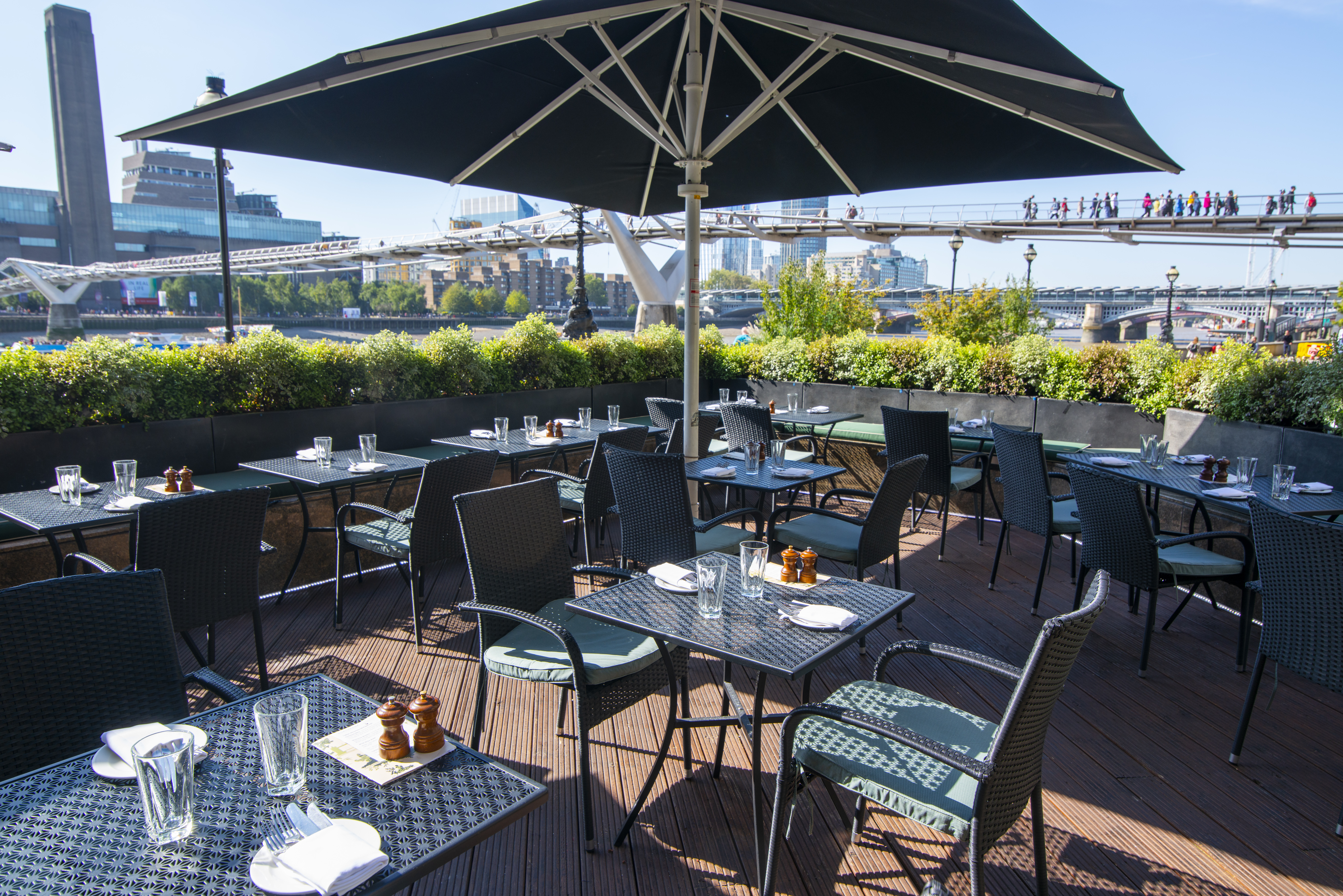 Outdoor dining terrace at Northbank Restaurant, perfect for casual networking events.