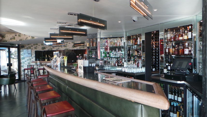 Stylish bar area in Northbank Restaurant for networking and social events.