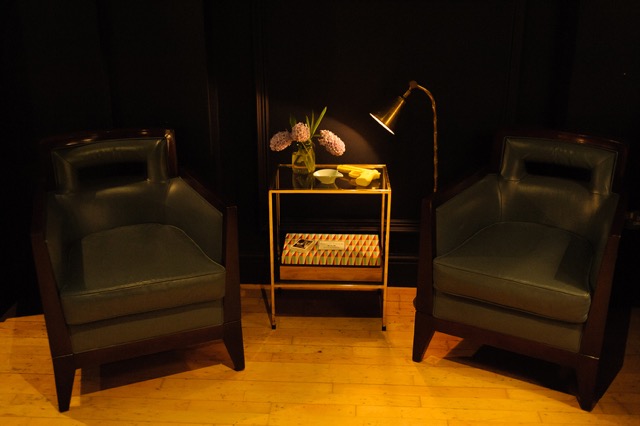 Cozy bar seating with stylish armchairs for intimate meetings and networking events.