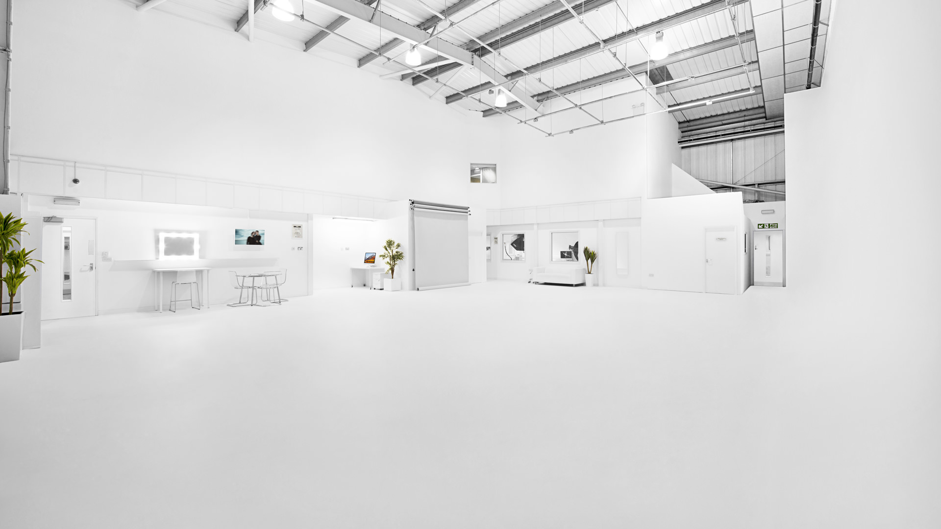 Spacious minimalist event space at S2 Royal Arsenal, perfect for corporate meetings and workshops.