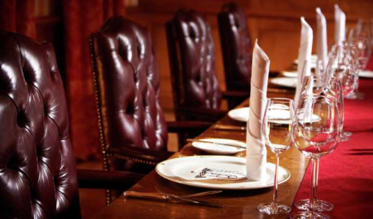 Elegant dining table in The Balmoral Suite, perfect for corporate dinners and meetings.