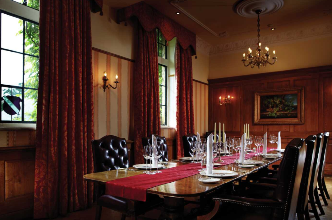 Elegant meeting room in The Balmoral Suite, ideal for formal gatherings and events.
