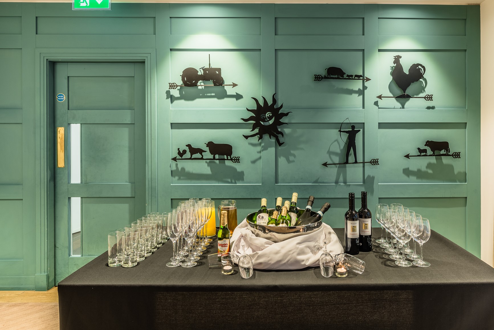 Elegant beverage station in Farmers & Fletchers, perfect for networking events.