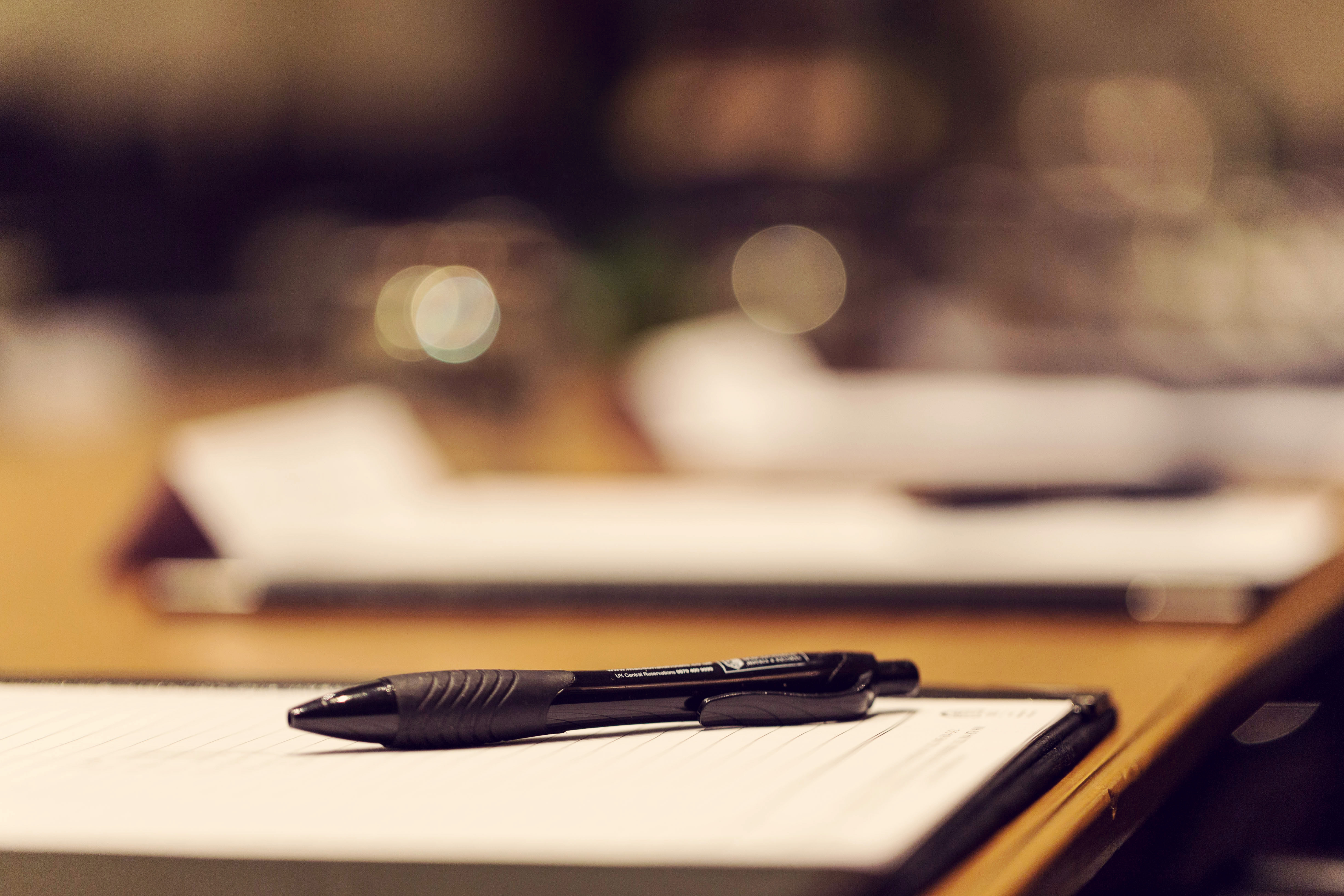 Waterhouse Suite meeting setup with clipboard and pen at Townhouse Hotel Manchester.