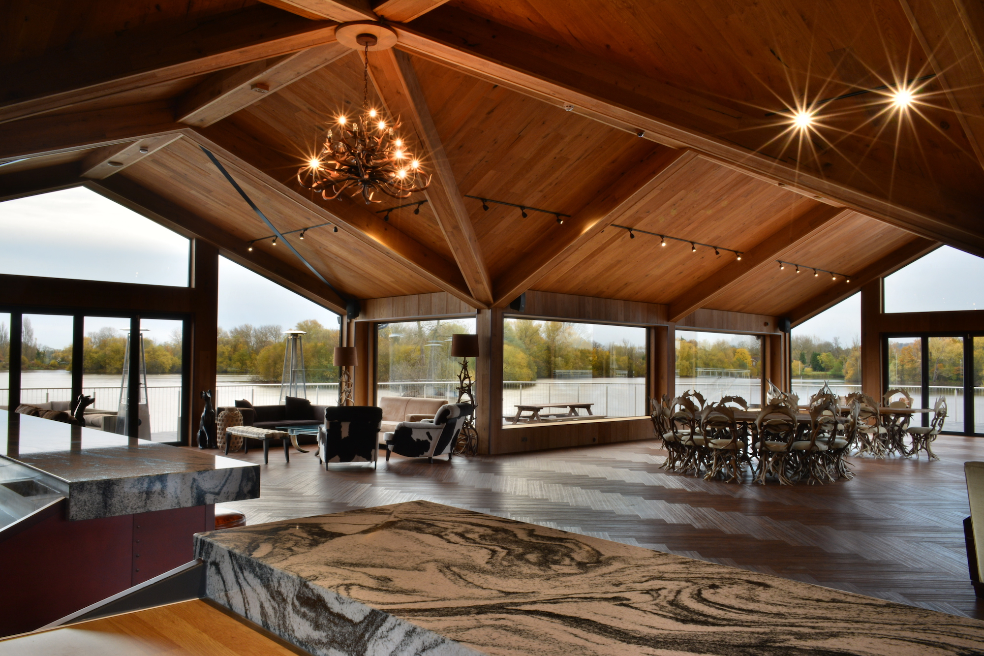 Elegant event space at Amber Lakes with large windows, ideal for corporate meetings and gatherings.