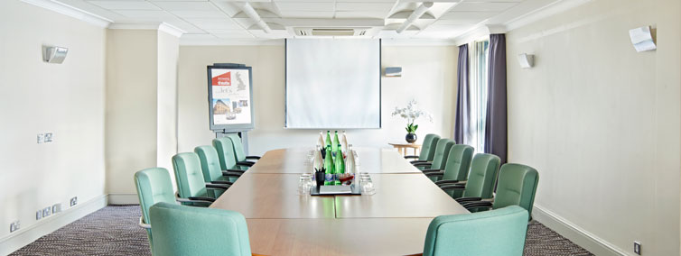 Convair Suite meeting room at Thistle London Heathrow, ideal for professional events.