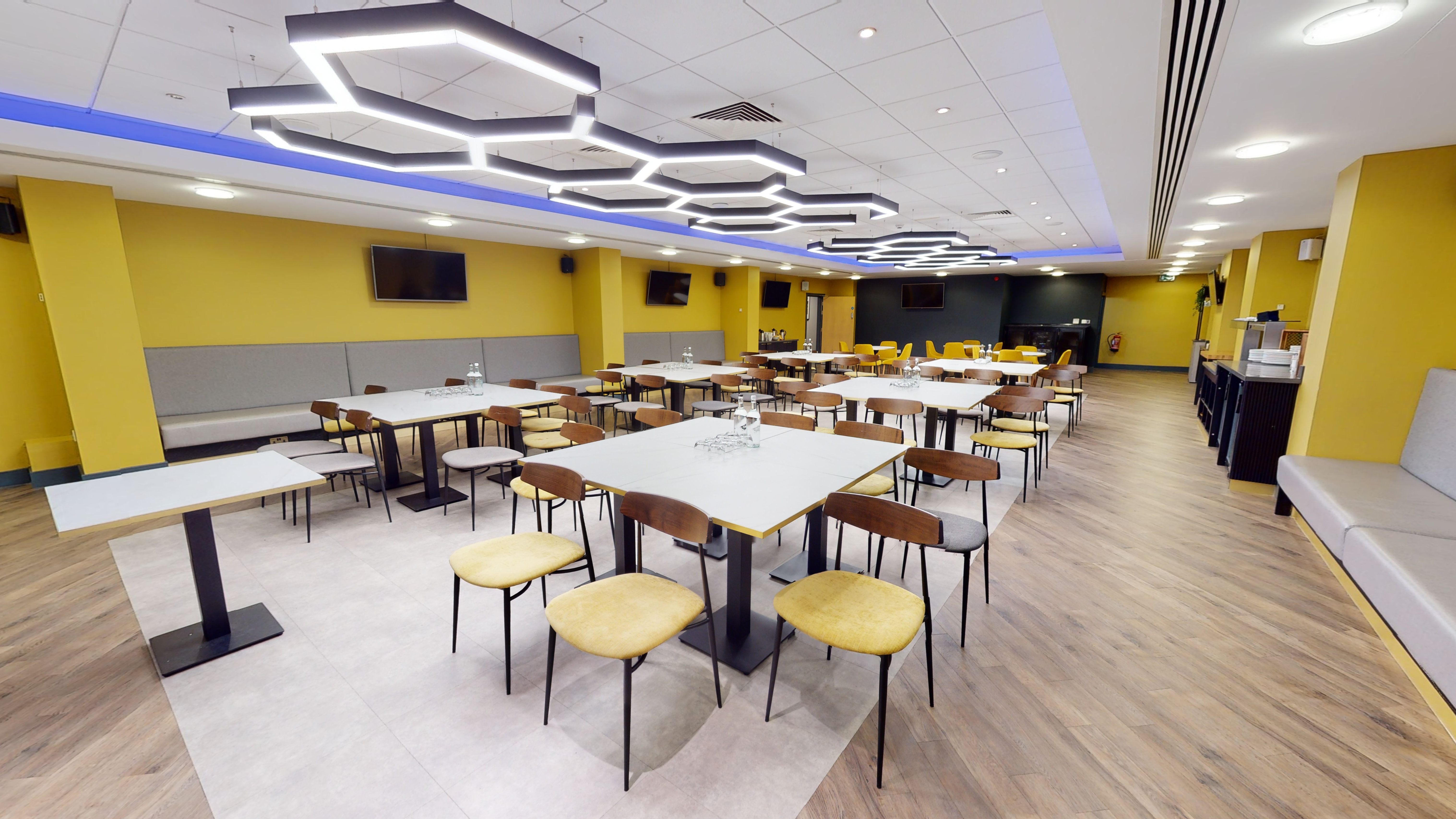 International Suite at Molineux Stadium, modern decor, ideal for meetings and events.