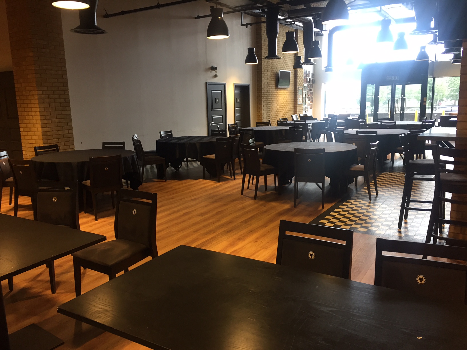 Spacious WV1 North Bank Bar at Molineux Stadium, ideal for events and dining.