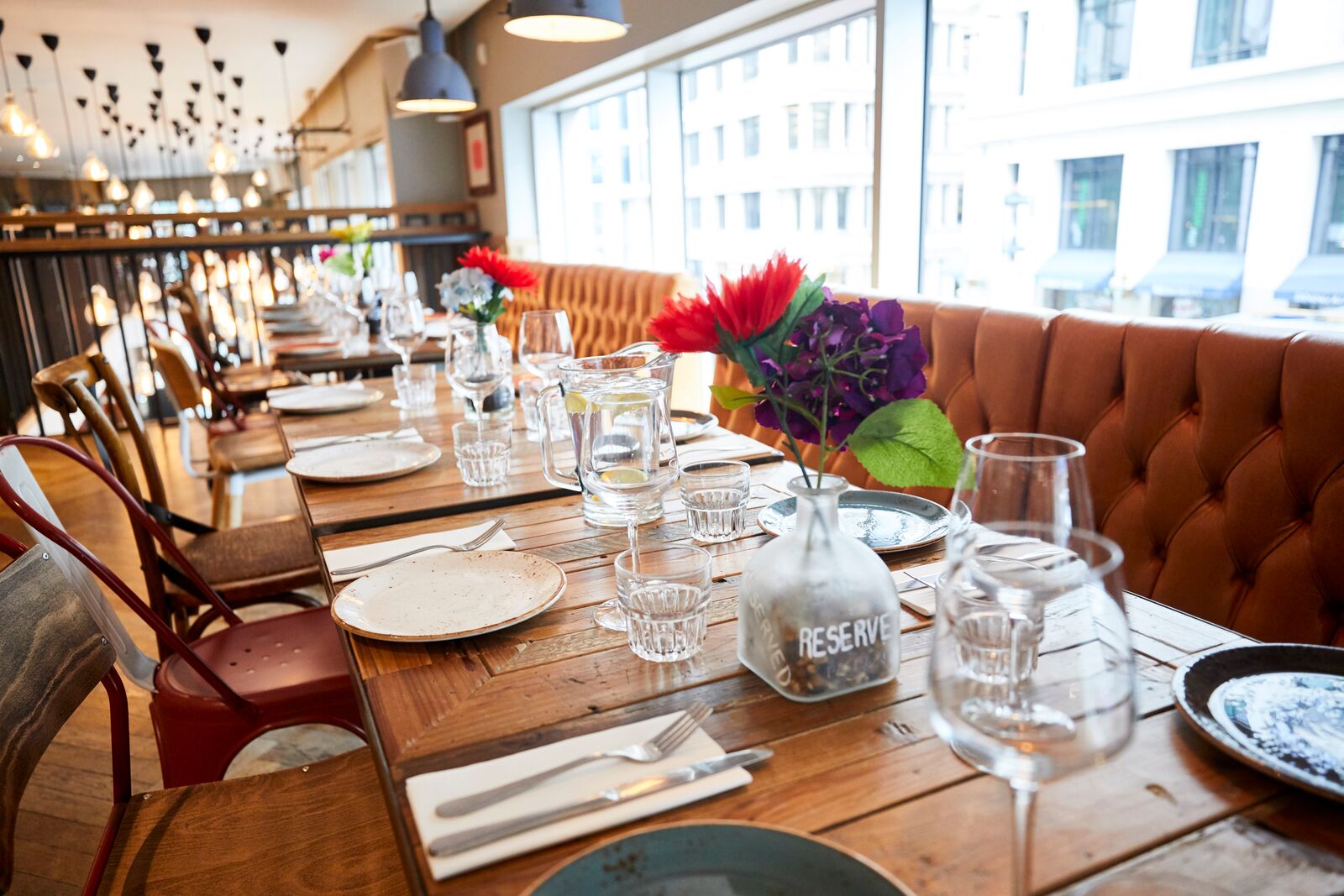 Elegant dining space with wooden table, ideal for events and gatherings at The Hydrant.