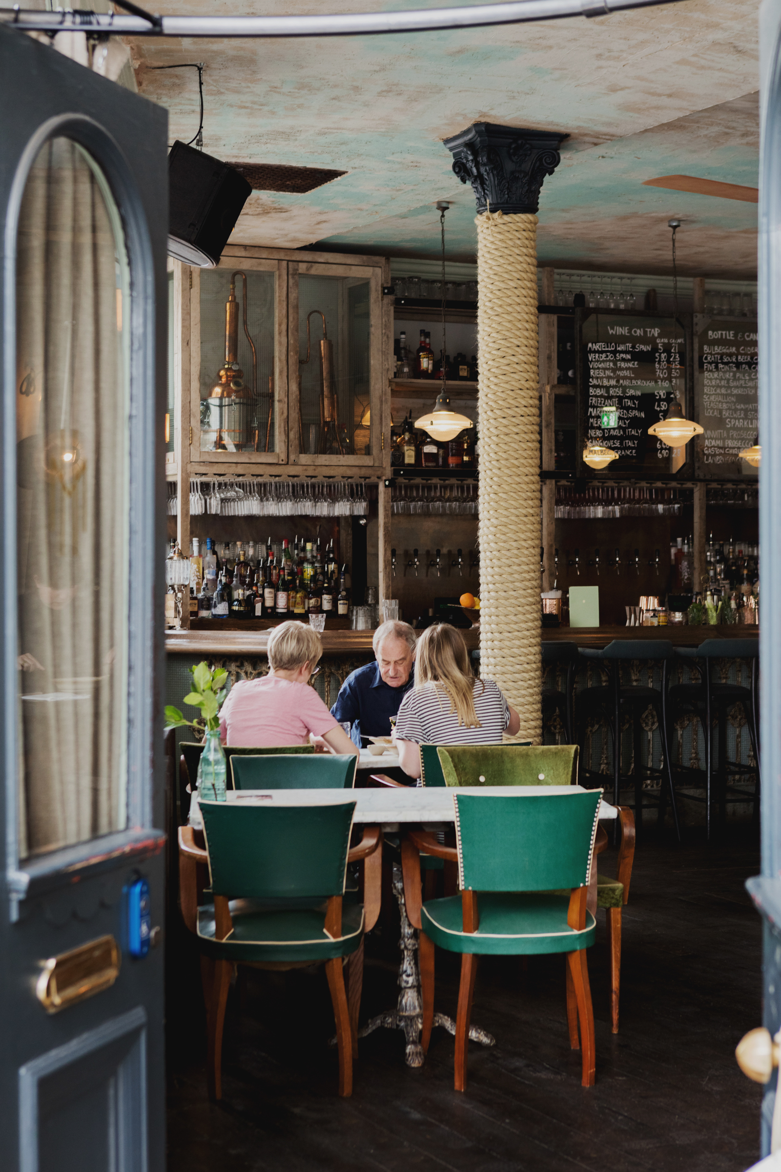 Cozy venue in Martello Hall with stylish bar, ideal for meetings and team-building events.