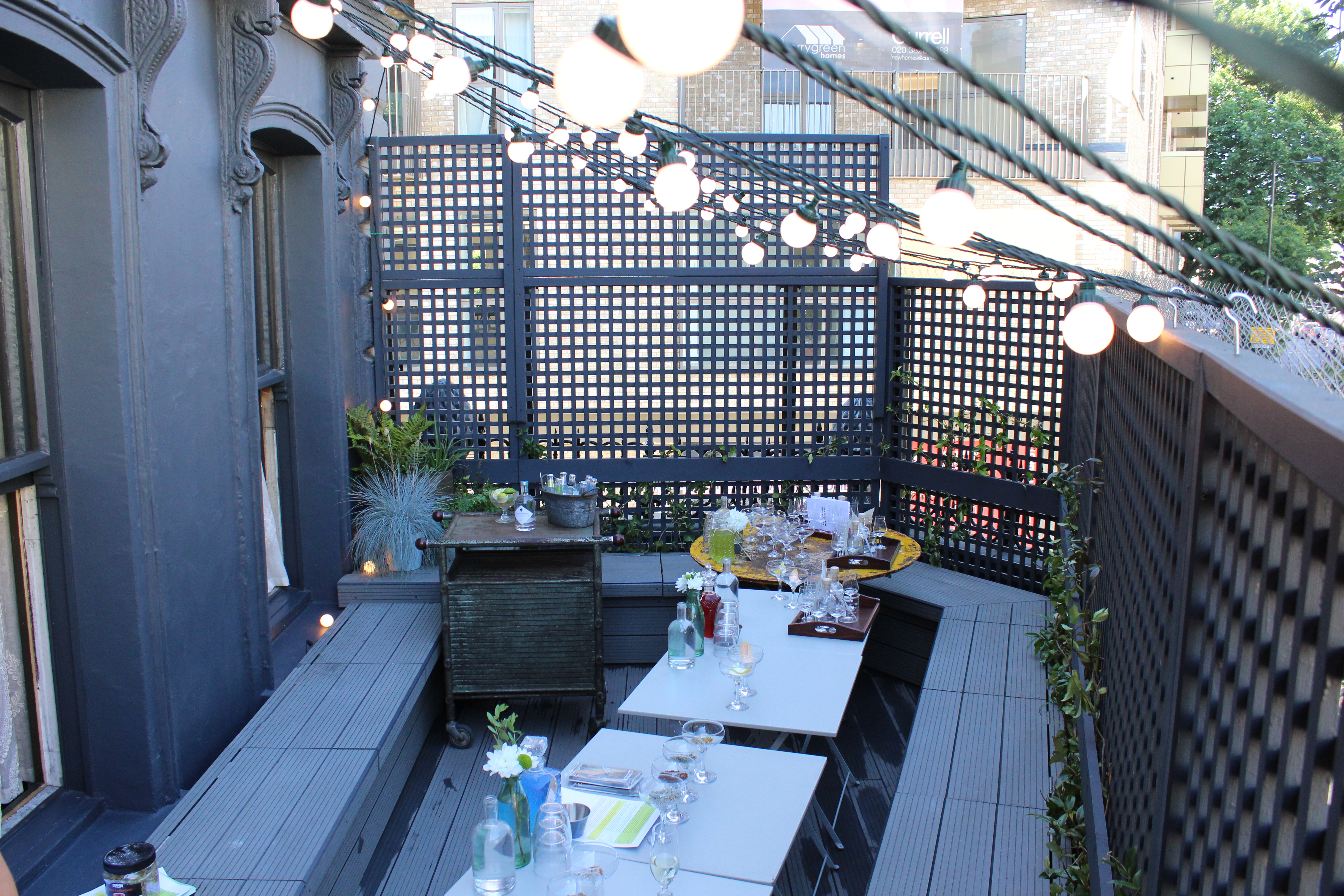 Charming outdoor event space at Martello Hall with string lights for intimate gatherings.