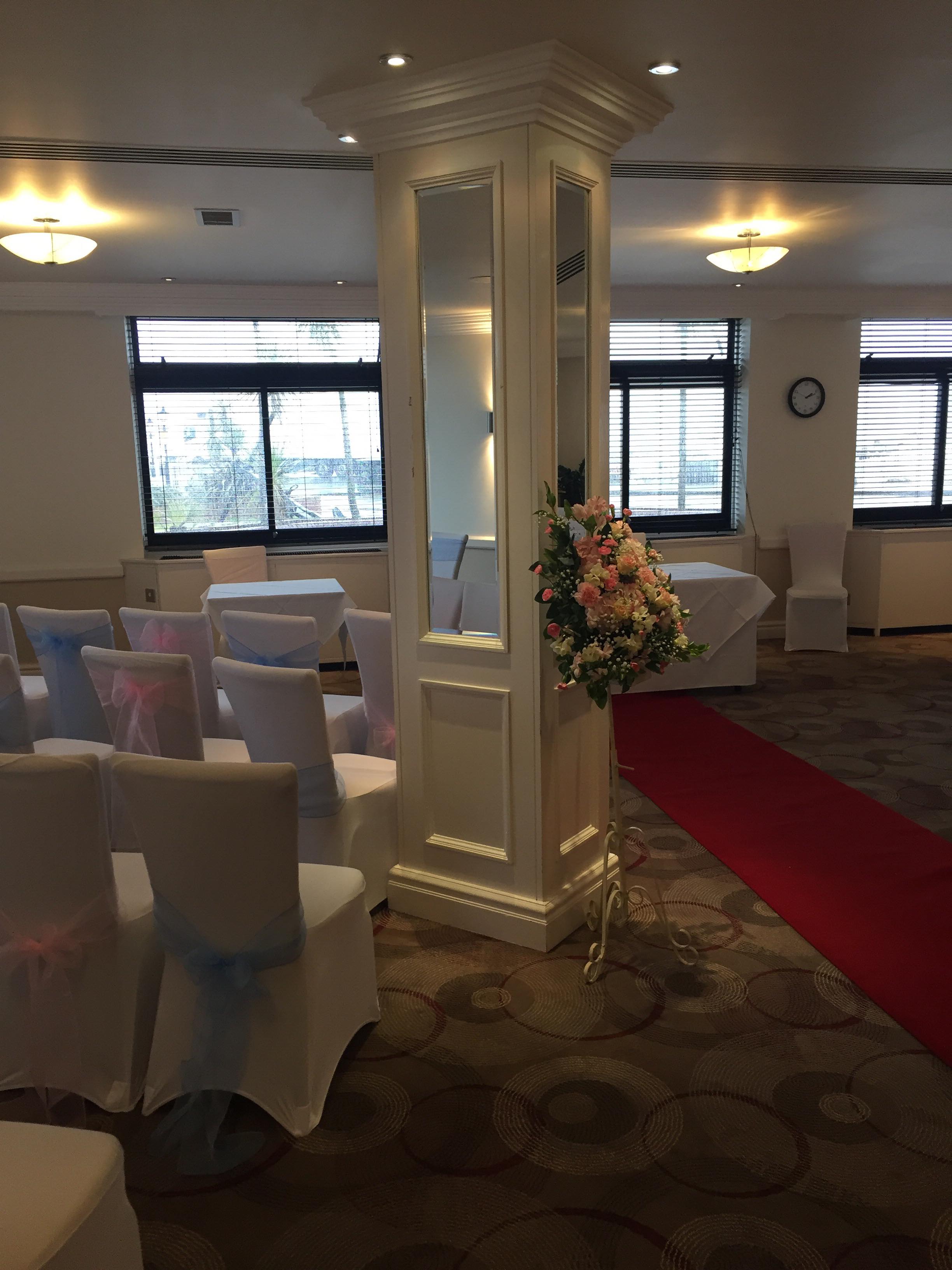Jolliffe Room at Thistle Poole with elegant chairs, perfect for weddings and events.