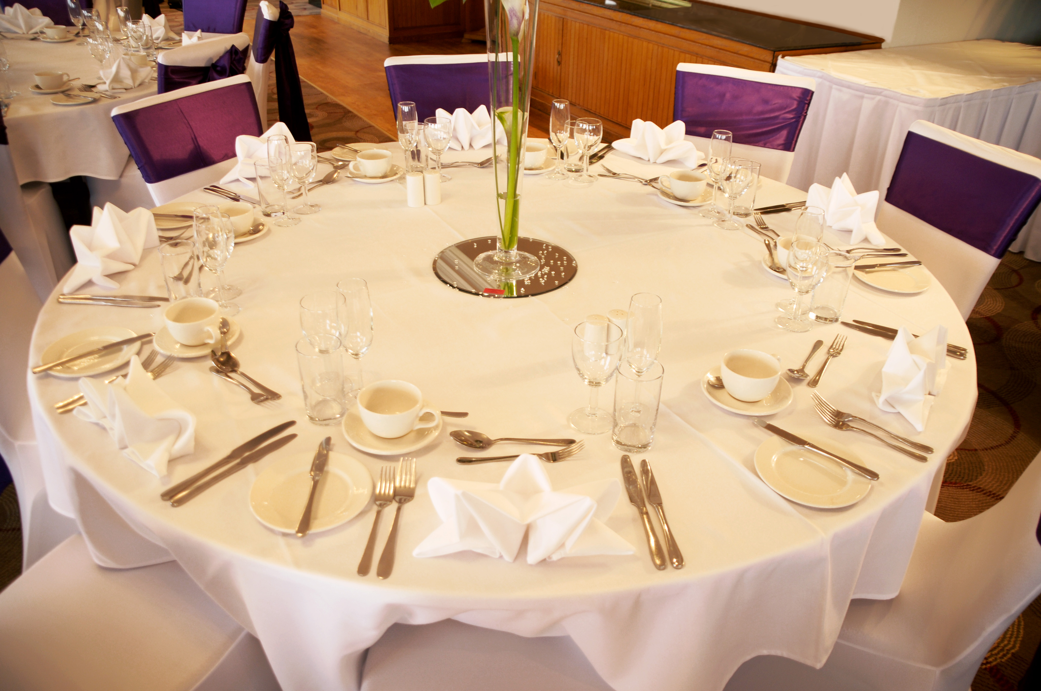Elegant round table setup in Jolliffe Room, Thistle Poole for corporate events.