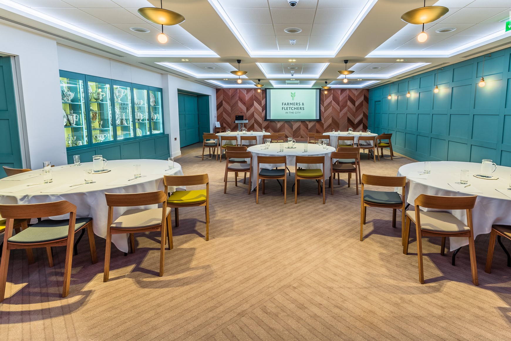 Great Hall meeting room with round tables, ideal for events and workshops.