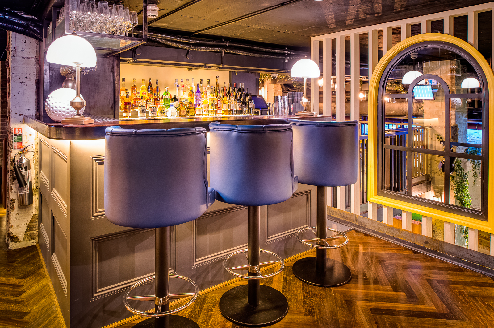 Stylish bar at Upperclub House, ideal for networking events and gatherings.