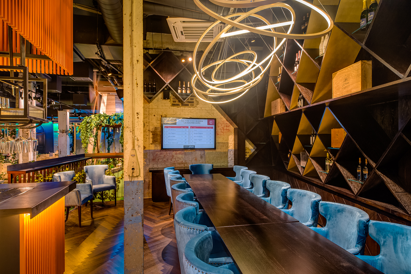 Modern Presidents Committee Room with plush blue chairs for corporate meetings.