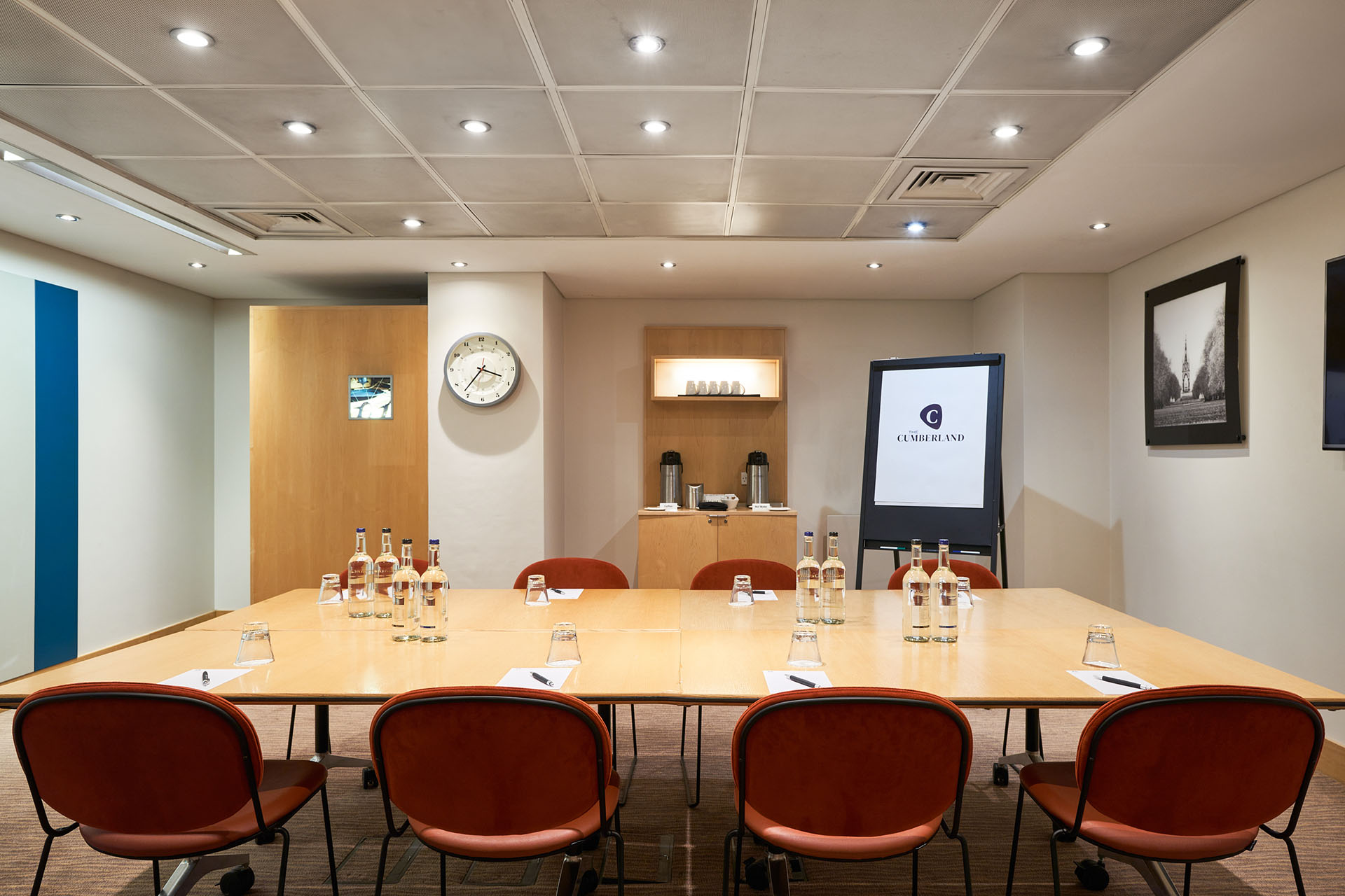 Meeting room at The Cumberland Hotel with polished table, ideal for professional events.
