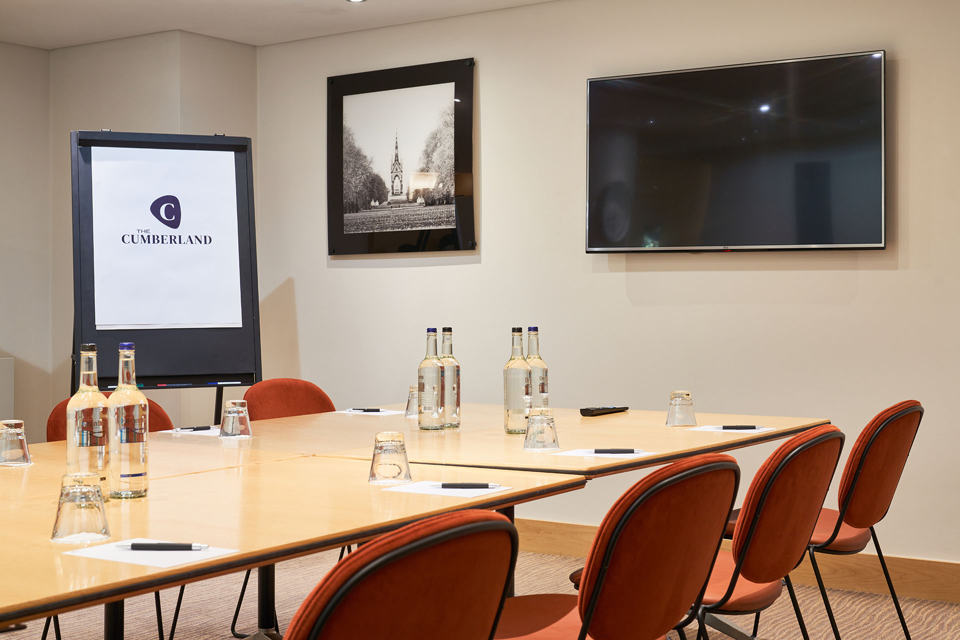 Meeting room at The Cumberland Hotel with large table, ideal for professional events.