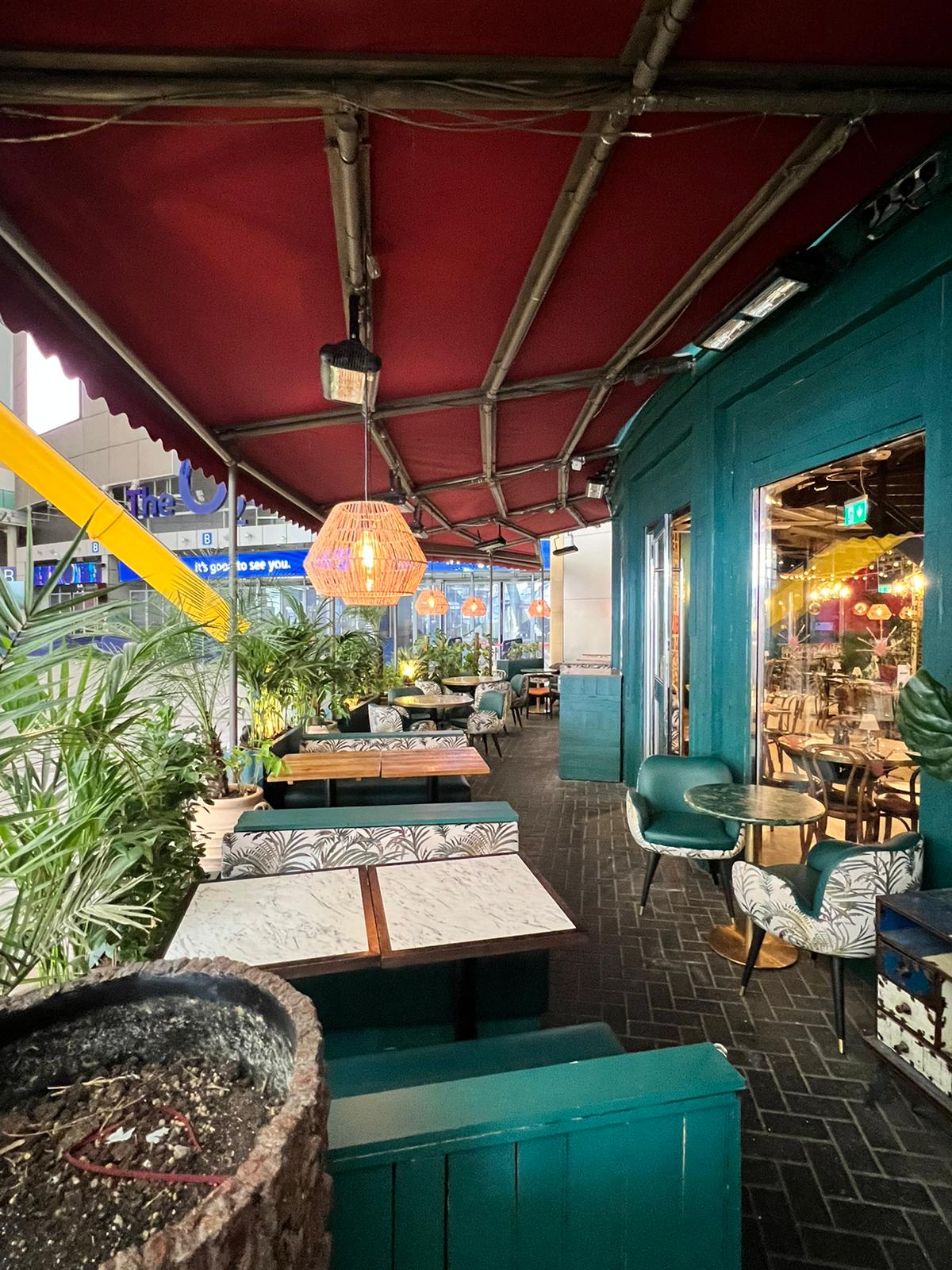 Vibrant outdoor dining at The Bar in Cabana @ The O2, perfect for networking events.