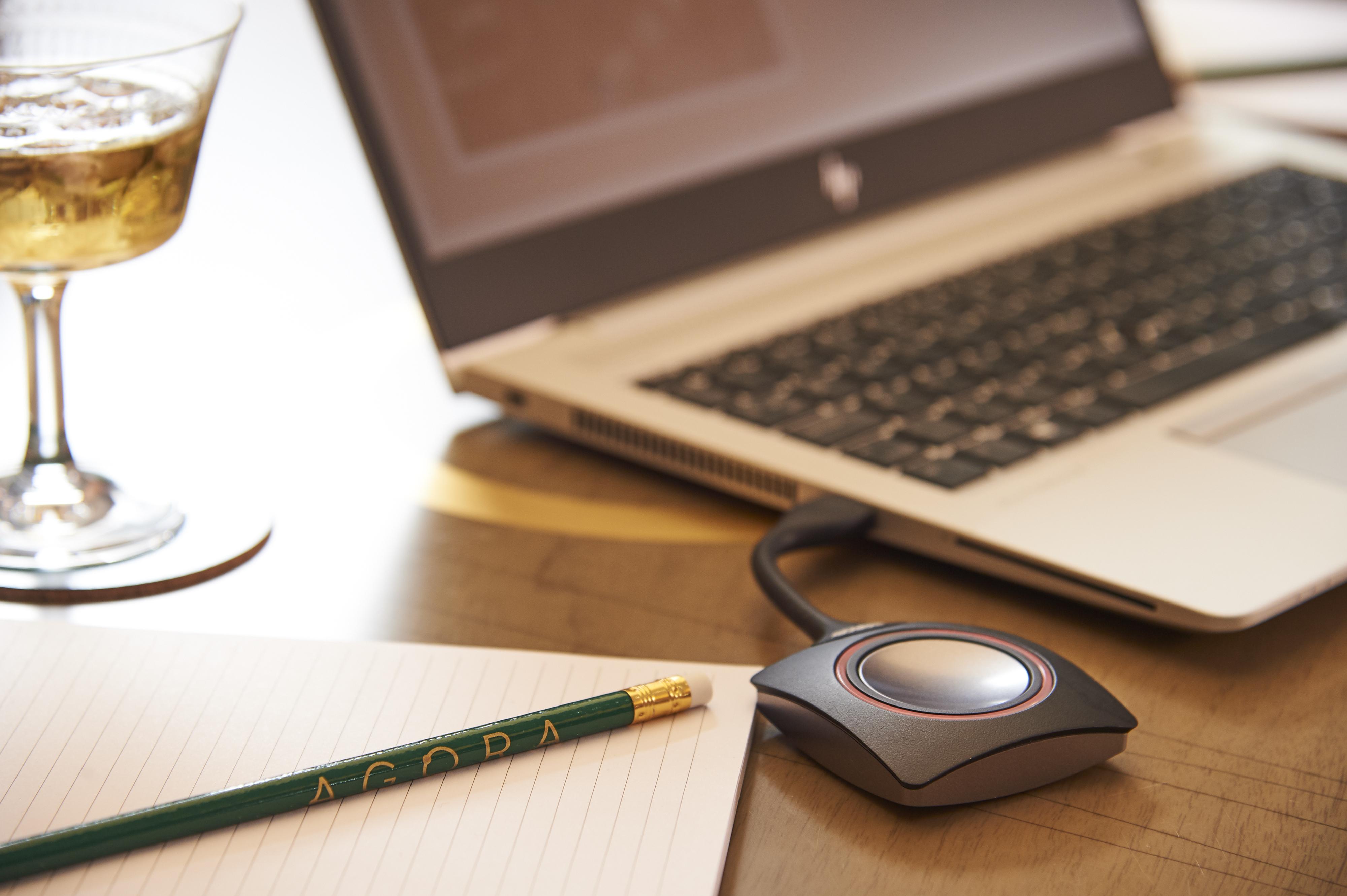 AGORA meeting space in Hilton London Bankside with laptop and notepad for events.