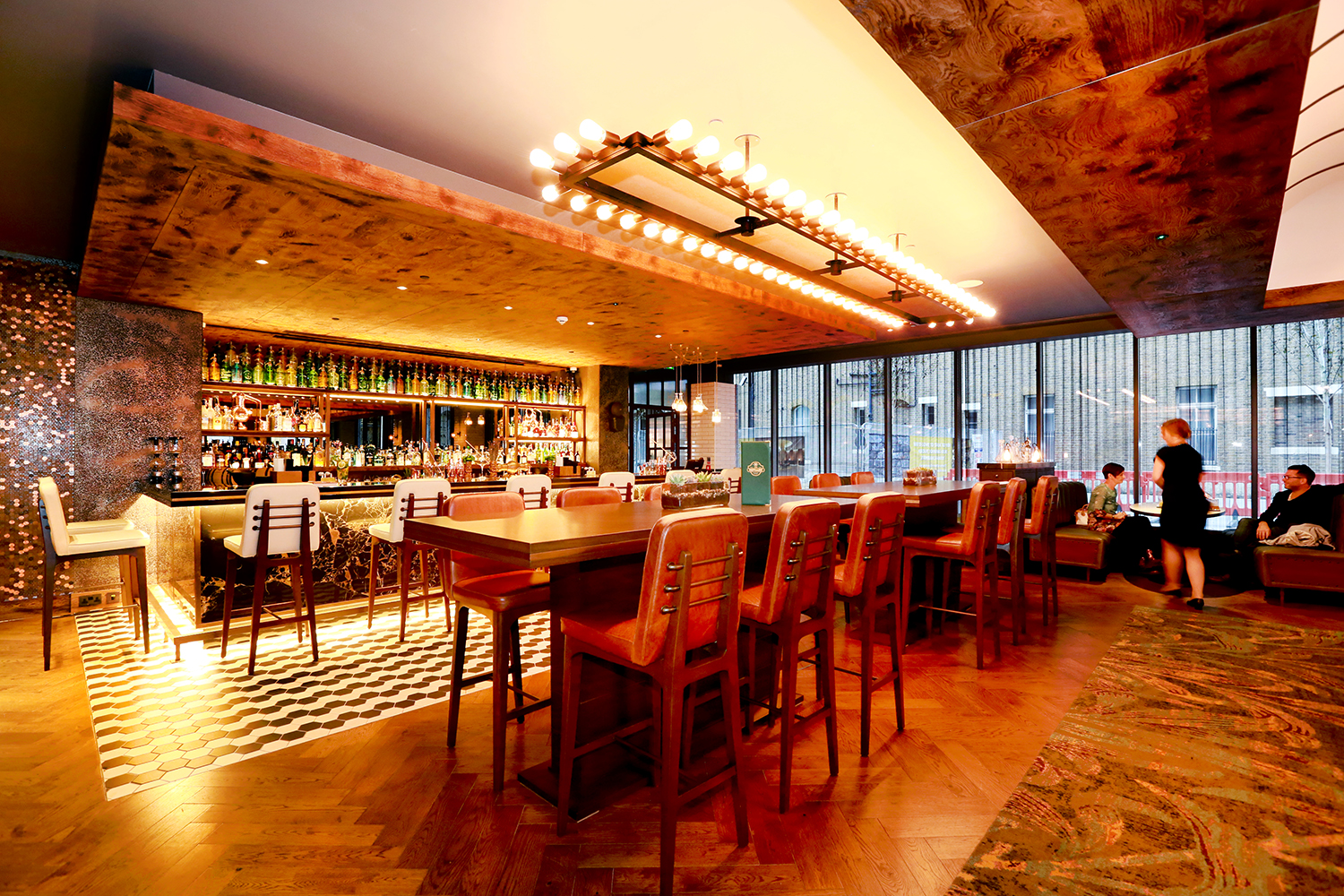 Stylish Distillery Bar in Hilton London Bankside, ideal for cocktail receptions and networking.