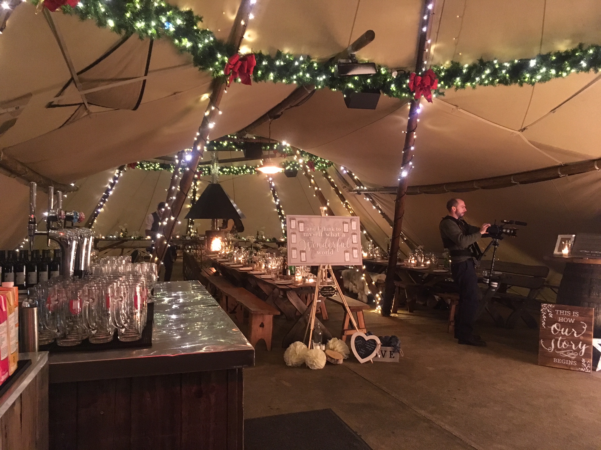 The Curious TeePee event space with warm lighting, ideal for weddings and celebrations.